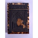 A LATE REGENCY PRESSED AND CARVED TORTOISESHELL CARD CASE decorated with an entrance to a cathedral.