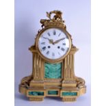 A LARGE MID 19TH CENTURY ORMOLU AND MALACHITE MANTEL CLOCK of scrolling classical form, the top