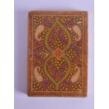 A 19TH CENTURY MIDDLE EASTERN PERSIAN KASHMIR LACQUER CARD CASE decorated with swirling motifs and