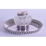 A VICTORIAN SILVER INKWELL ON SILVER DISH. Sheffield 1886. 2.8 oz. (2)