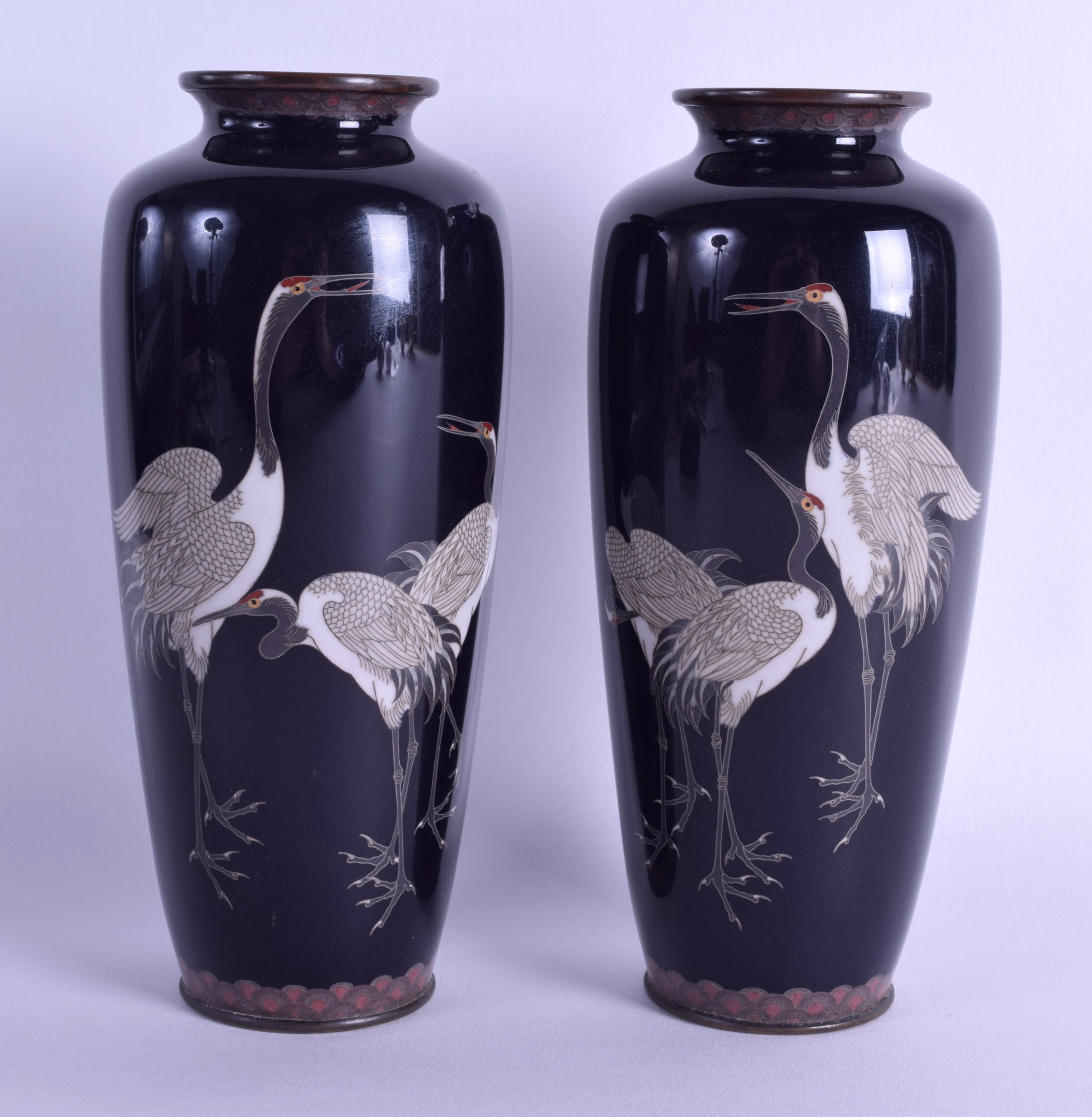 A GOOD PAIR OF EARLY 20TH CENTURY JAPANESE MEIJI PERIOD CLOISONNE ENAMEL VASES decorated with