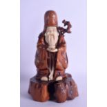 A GOOD 19TH CENTURY JAPANESE MEIJI PERIOD CARVED BOXWOOD SHIBAYMA INLAID FIGURE with ivory features,