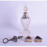 AN EDWARDIAN SILVER MOUNTED CUT GLASS BOTTLE AND STOPPER together with a pair of antique silver