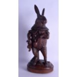 A RARE LATE 19TH CENTURY BAVARIAN BLACK FOREST TOBACCO JAR AND COVER in the form of a standing hare,