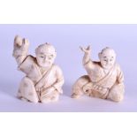 A PAIR OF LATE 19TH CENTURY JAPANESE MEIJI PERIOD CARVED BONE OKIMONO modelled in robes with hands