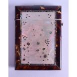 A VICTORIAN CARVED TORTOISESHELL AND MOTHER OF PEARL CARD CASE decorated with floral sprays and