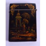 AN EARLY 19TH CENTURY BLACK LACQUERED PAPIER MACHE CARD CASE painted with Middle Eastern figures