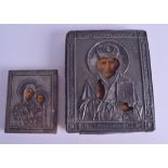 TWO RUSSIAN SILVER MOUNTED ICONS. 11 cm x 14 cm & 9 cm x 7 cm. (2)