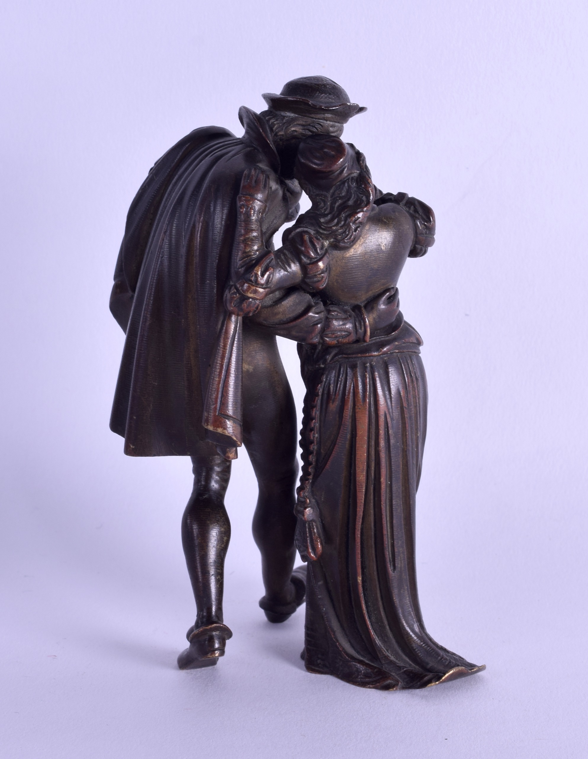 A LATE 19TH CENTURY EUROPEAN BRONZE FIGURE OF A CAVALIER modelled consoling a female. 12.75 cm - Image 2 of 3