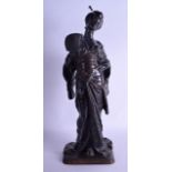 A GOOD 19TH CENTURY FRENCH BRONZE FIGURE OF A JAPANESE GEISHA by G Wagner, modelled holding a fan.
