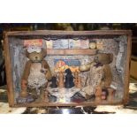 AN EARLY 20TH CENTURY DIORAMA, depicting two bears playing chess in an interior. 21 cm x 35 cm.