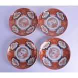 A SET OF FOUR 19TH CENTURY JAPANESE MEIJI PERIOD IMARI DISHES painted with dragons and panels of