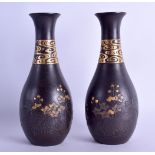 A FINE PAIR OF 19TH CENTURY JAPANESE MEIJI PERIOD IRON VASES gold inlaid with swirling cloud like