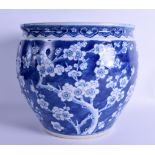 A LARGE 19TH CENTURY CHINESE BLUE AND WHITE PORCELAIN PLANTER bearing Kangxi marks to base,