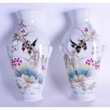 A PAIR OF CHINESE FAMILLE ROSE PORCELAIN WALL POCKETS probably Republican period, painted with two