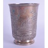 AN UNUSUAL EARLY 19TH CENTURY SILVER BEAKER decorated in relief with extensive landscapes. London