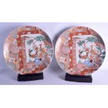 A LARGE PAIR OF 19TH CENTURY JAPANESE MEIJI PERIOD IMARI CHARGERS painted with exotic birds within