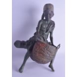AN ANTIQUE AUSTRIAN COLD PAINTED BRONZED FIGURE OF A SEATED MALE modelled holding an open basket. 44