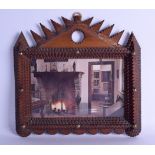 A RARE LARGE AMERICAN TRAMP ART PHOTOGRAPH FRAME with stud work decoration. 32 cm x 30 cm.