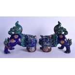 A PAIR OF 19TH CENTURY JAPANESE MEIJI PERIOD BLUE GLAZED BUDDHISTIC LIONS embellished with gilt