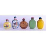 A GROUP OF FIVE CHINESE PEKING GLASS SNUFF BOTTLES AND STOPPERS in various forms and sizes.