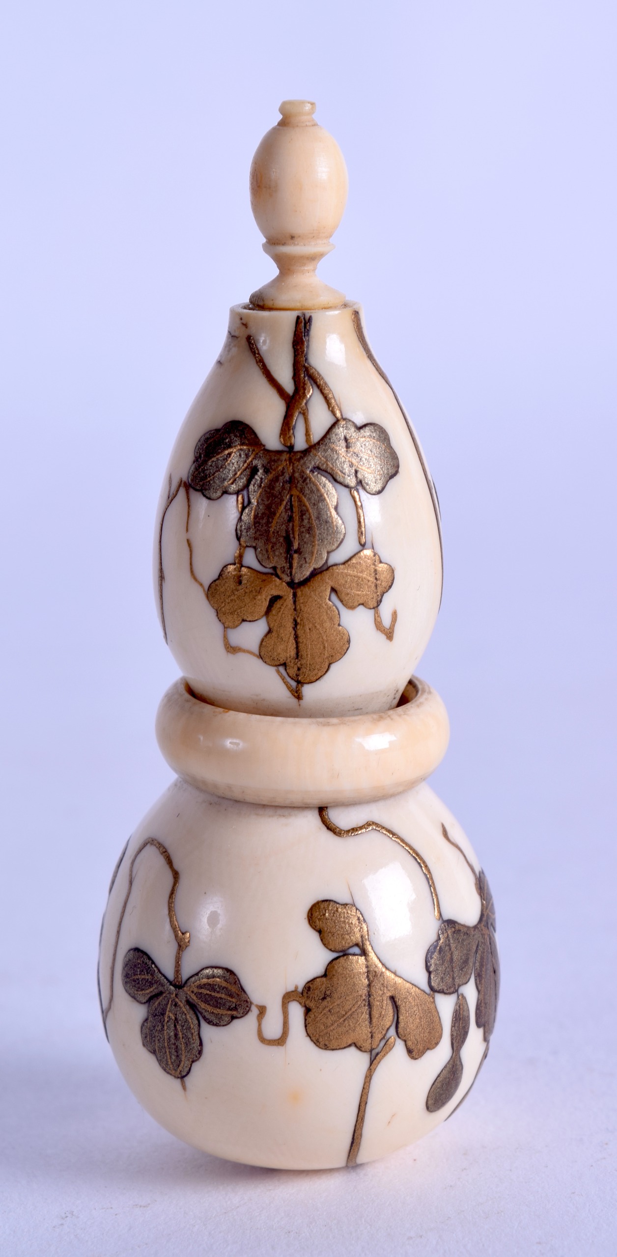 A GOOD 19TH CENTURY JAPANESE MEIJI PERIOD CARVED IVORY DOUBLE GOURD SCENT BOTTLE overlaid in gold