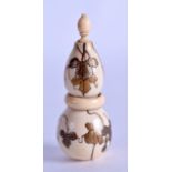 A GOOD 19TH CENTURY JAPANESE MEIJI PERIOD CARVED IVORY DOUBLE GOURD SCENT BOTTLE overlaid in gold