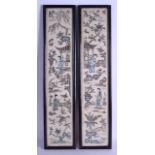 A PAIR OF LATE 19TH CENTURY CHINESE FRAMED SILKWORK PANELS depicting figures within landscapes. Silk