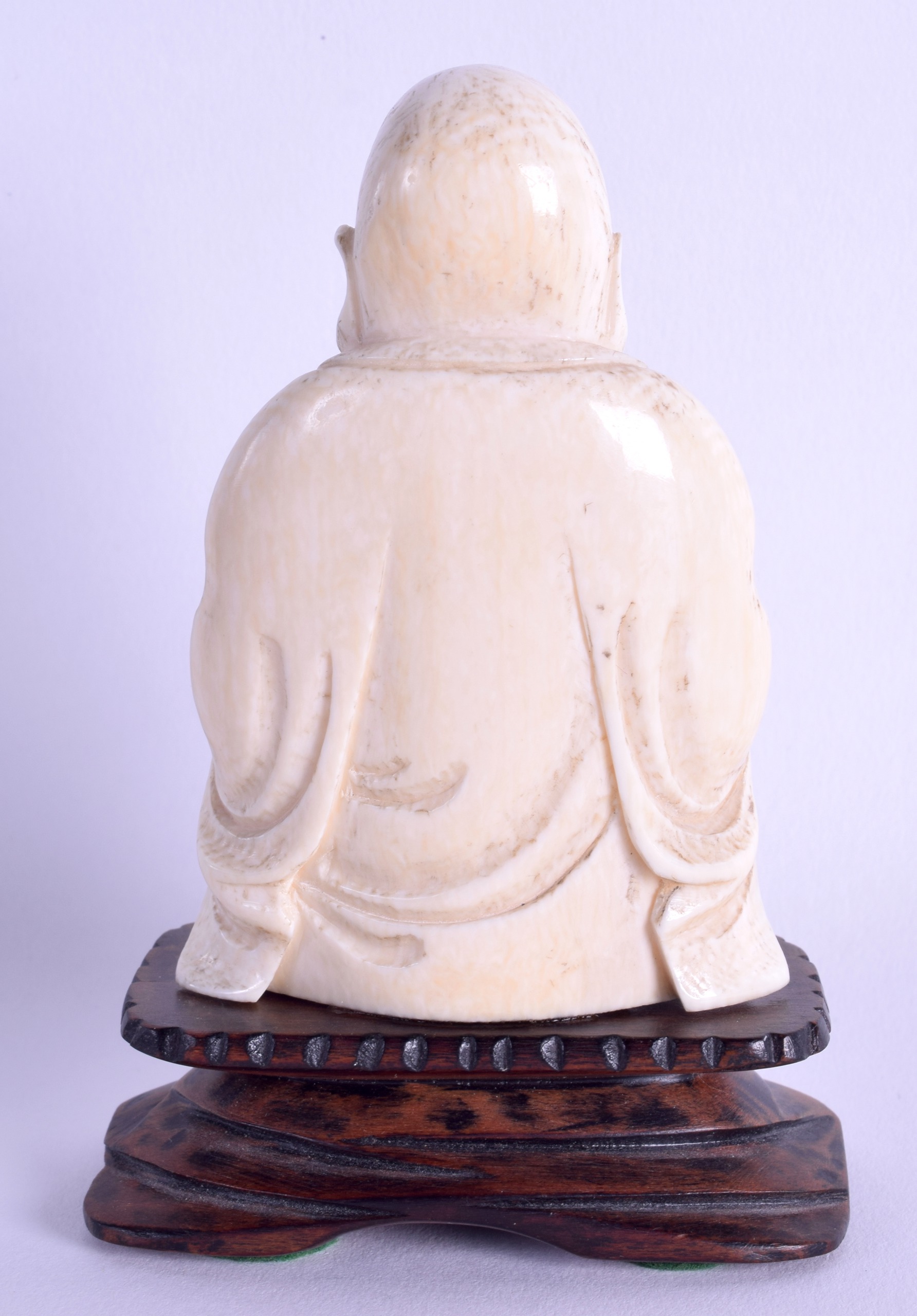 A LATE 19TH CENTURY CHINESE CARVED IVORY FIGURE OF A BUDDHA modelled in robes. Ivory 9 cm x 5.75 - Image 2 of 2