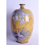 AN UNUSUAL 19TH CENTURY JAPANESE MEIJI PERIOD CLOISONNE ENAMEL VASE decorated with foliage on a