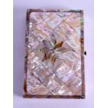 A MID 19TH CENTURY CARVED MOTHER OF PEARL CARD CASE inset with a star cut central motif. 6.5 cm x