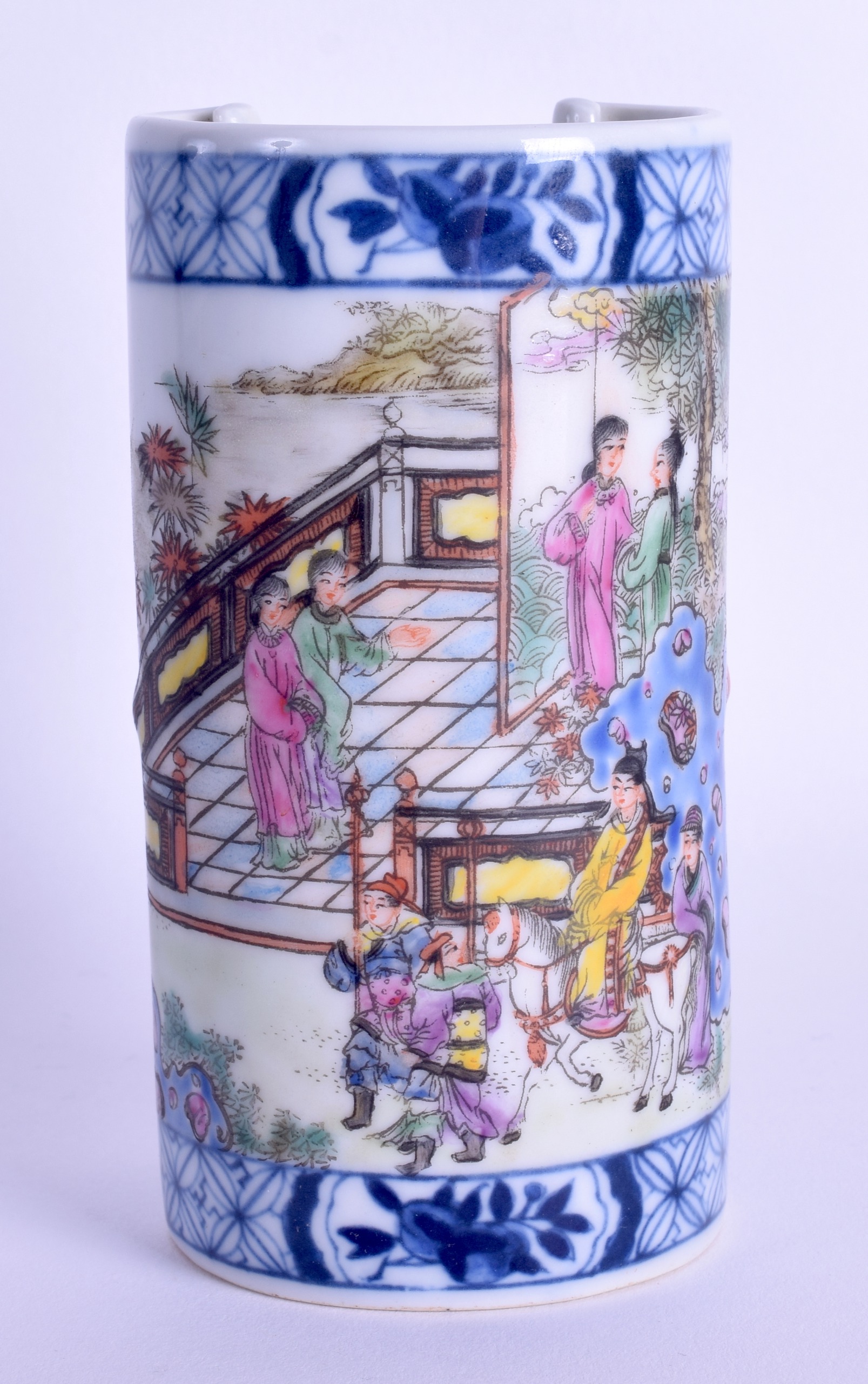 A CHINESE FAMILLE ROSE PORCELAIN BRUSH POT 20th Century, bearing Qianlong marks to base, painted