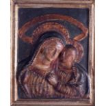 AN 18TH/19TH CENTURY EUROPEAN STUCCO PLAQUE depicting Madonna & Child. 21 cm x 26 cm.