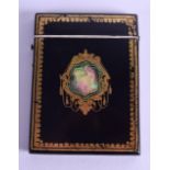 AN EARLY VICTORIAN BLACK LACQUER PAPIER MACHE CARD CASE decorated with a gilt cartouche. 8 cm x 10.5