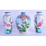 A PAIR OF EARLY 20TH CENTURY JAPANESE MEIJI PERIOD CLOISONNE ENAMEL VASES decorated with fish,