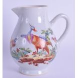 An 18th Century Chinese sparrow beak jug painted with exotic birds probably London decorated. 9.