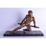 A LARGE ART DECO POLISHED BRONZE FIGURE OF A MUSCULAR MALE modelled upon a veined marble base. 66 cm