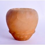 AN EGYPTIAN CARVED ALABASTER JAR Antiquity style. 8.75 cm high.