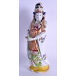 A 19TH CENTURY JAPANESE MEIJI PERIOD AO KUTANI PORCELAIN FIGURE OF GUANYIN modelled holding a