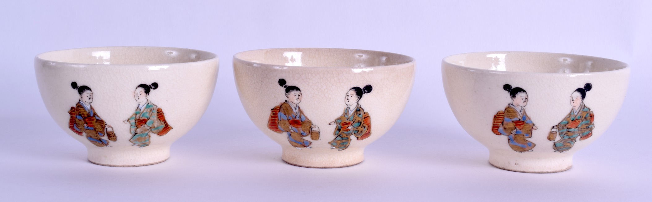 A SET OF THREE EARLY 20TH CENTURY JAPANESE MEIJI PERIOD SATSUMA TEABOWLS painted with figures. 7 - Image 2 of 3