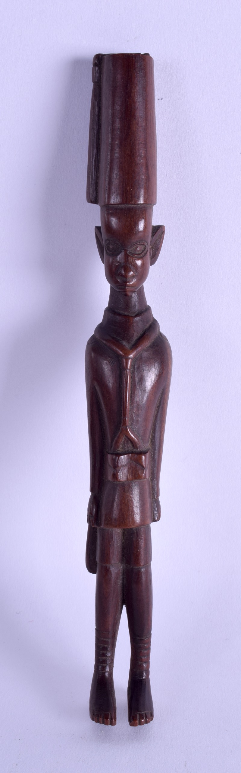 AN UNUSUAL EARLY 20TH CENTURY AFRICAN CARVED WOOD FIGURE OF MALE possibly representing a police