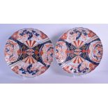 A LARGE PAIR OF 19TH CENTURY JAPANESE MEIJI PERIOD IMARI DISHES painted with fan shaped panels of