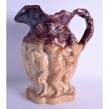 A LARGE 19TH CENTURY ENGLISH STONEWARE POTTERY JUG decorated in relief with Bacchus type figures