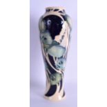 A MOORCROFT 'TREES IN MOONLIGHT' VASE designed by Vicky Lovatt. No 76 of 150. 26.5 cm high.