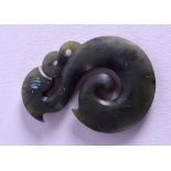 A MAORI CARVED JADE FISH HOOK PENDANT. 4.75 cm long.