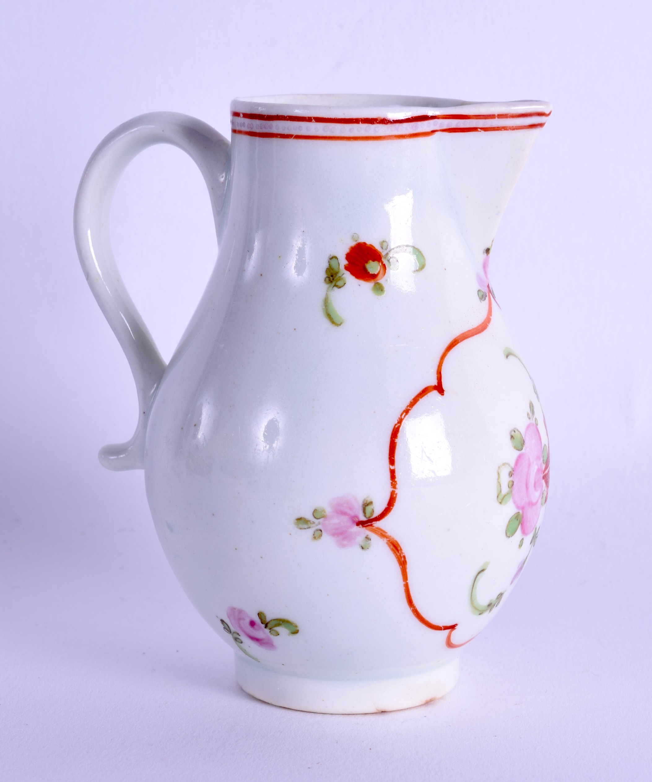 18th c. Lowestoft sparrow beak jug painted with a red line cartouche painted with a flower and - Image 2 of 3