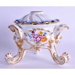 Meissen pot pourri urn and cover on four feet painted with flowers in gilded cartouches under a