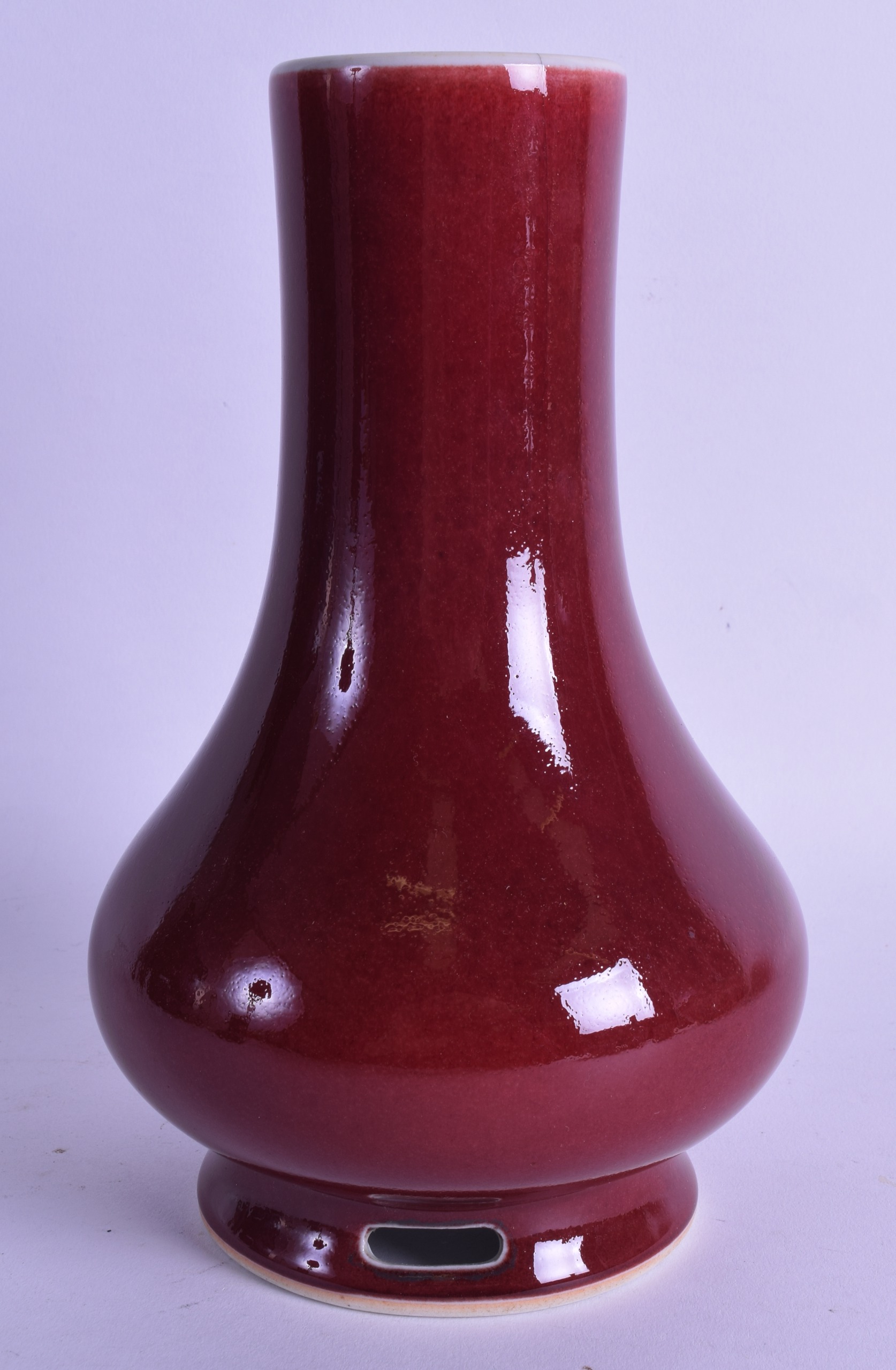 A CHINESE SANG DU BOEUF BALUSTER VASE with open work foot. 21.5 cm high. - Image 2 of 3