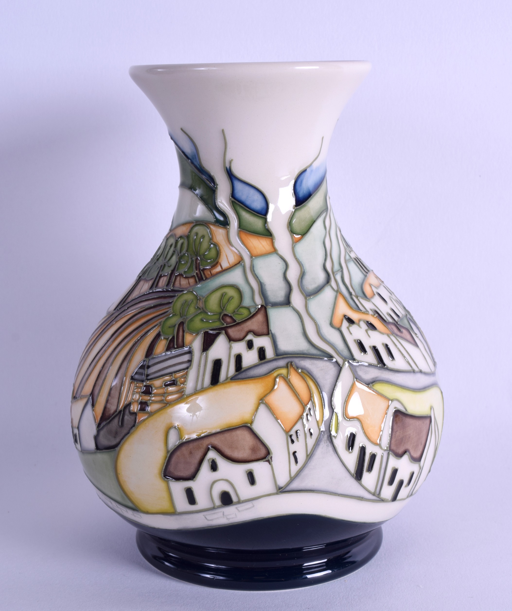 A MOORCROFT 'SNEEM' VASE designed by Paul Hilditch. No 115 of 150. 15 cm high.