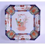 A LARGE 19TH CENTURY JAPANESE MEIJI PERIOD IMARI SQUARE FORM PORCELAIN DISH painted with urns and